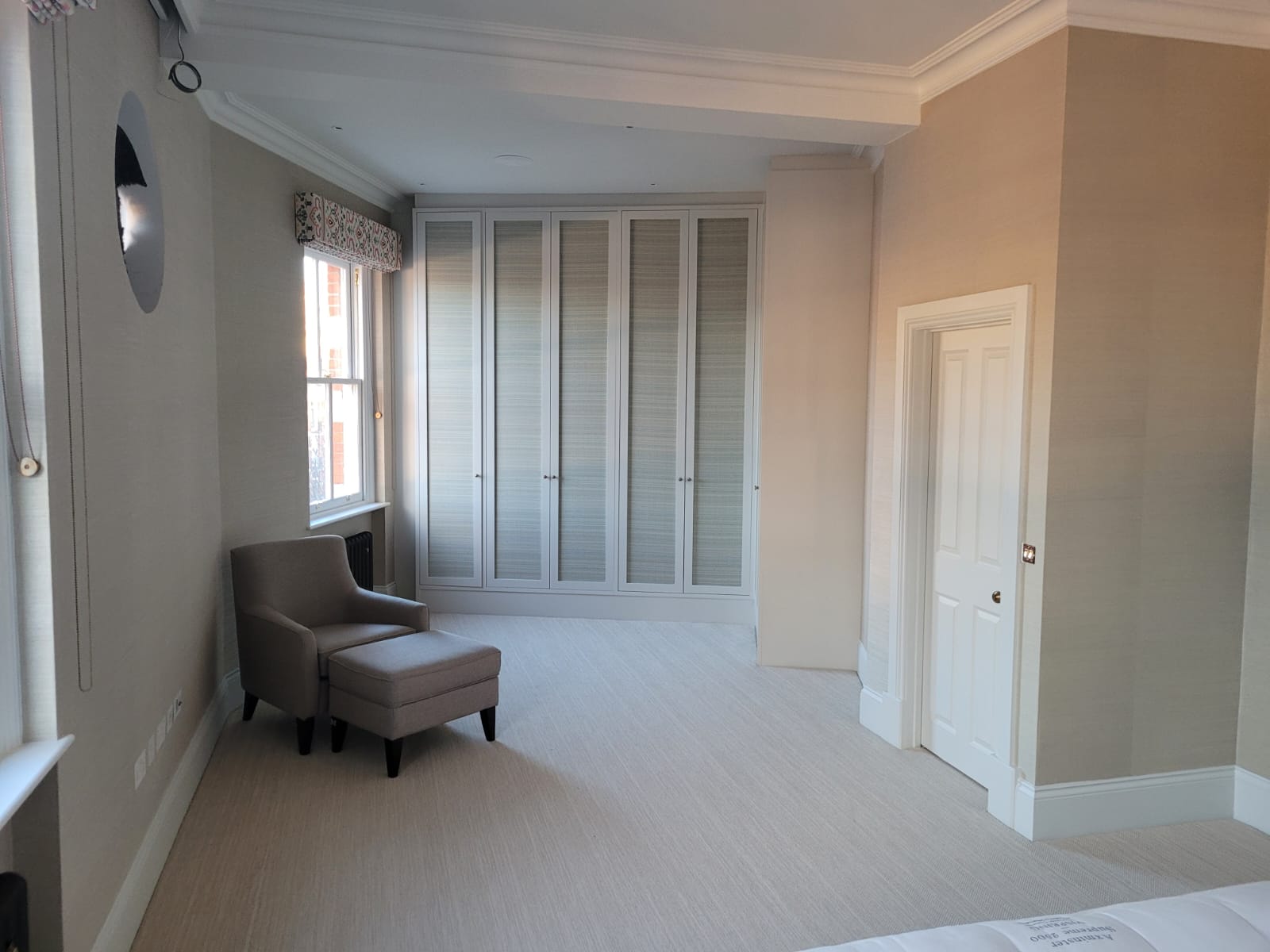 Principal bedroom with floor-to-ceiling wardrobe joinery