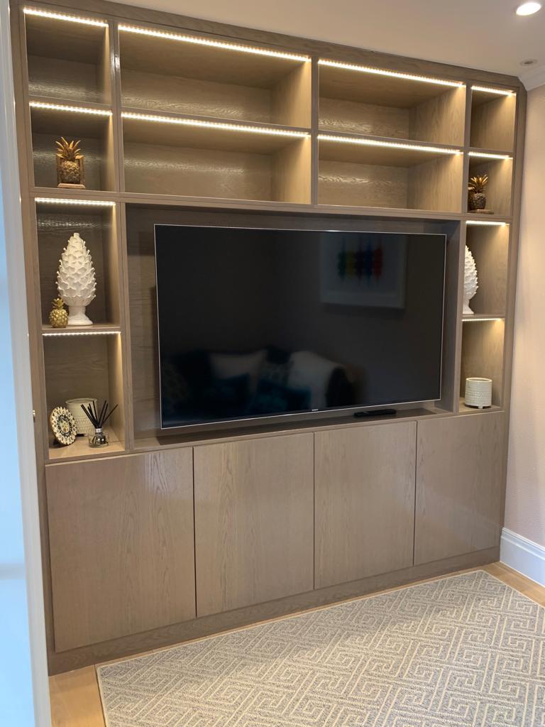 Media room with bespoke oak joinery and integrated lighting